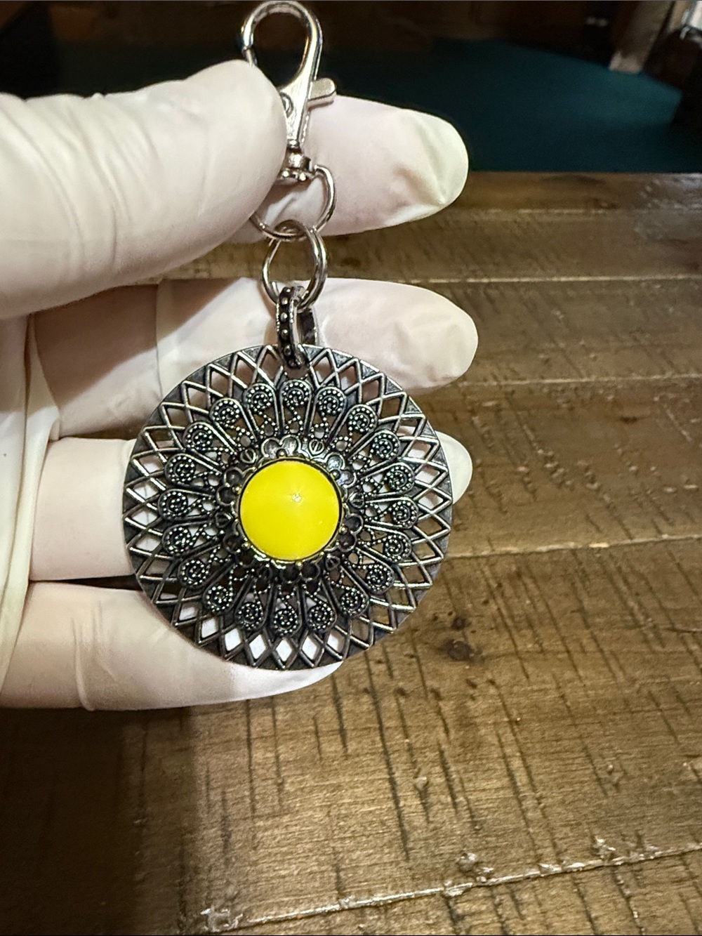 Silver Floral Medallion Keychain Pendant with Yellow Center